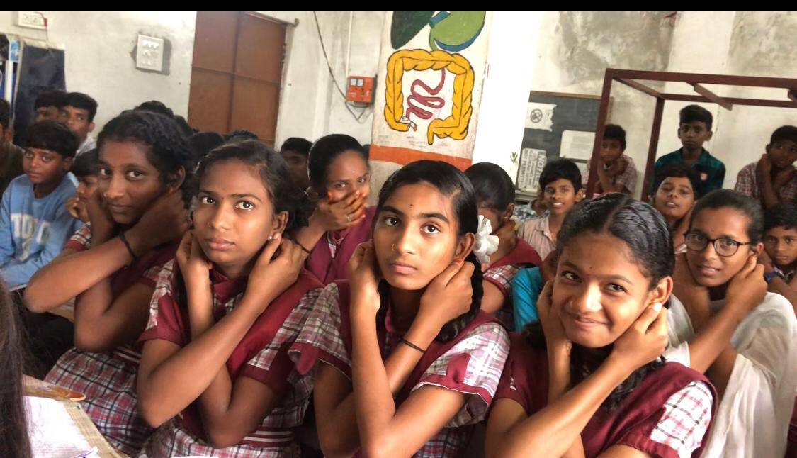 Positioning of fingers on earlobes-ZPHS, Bheemgal