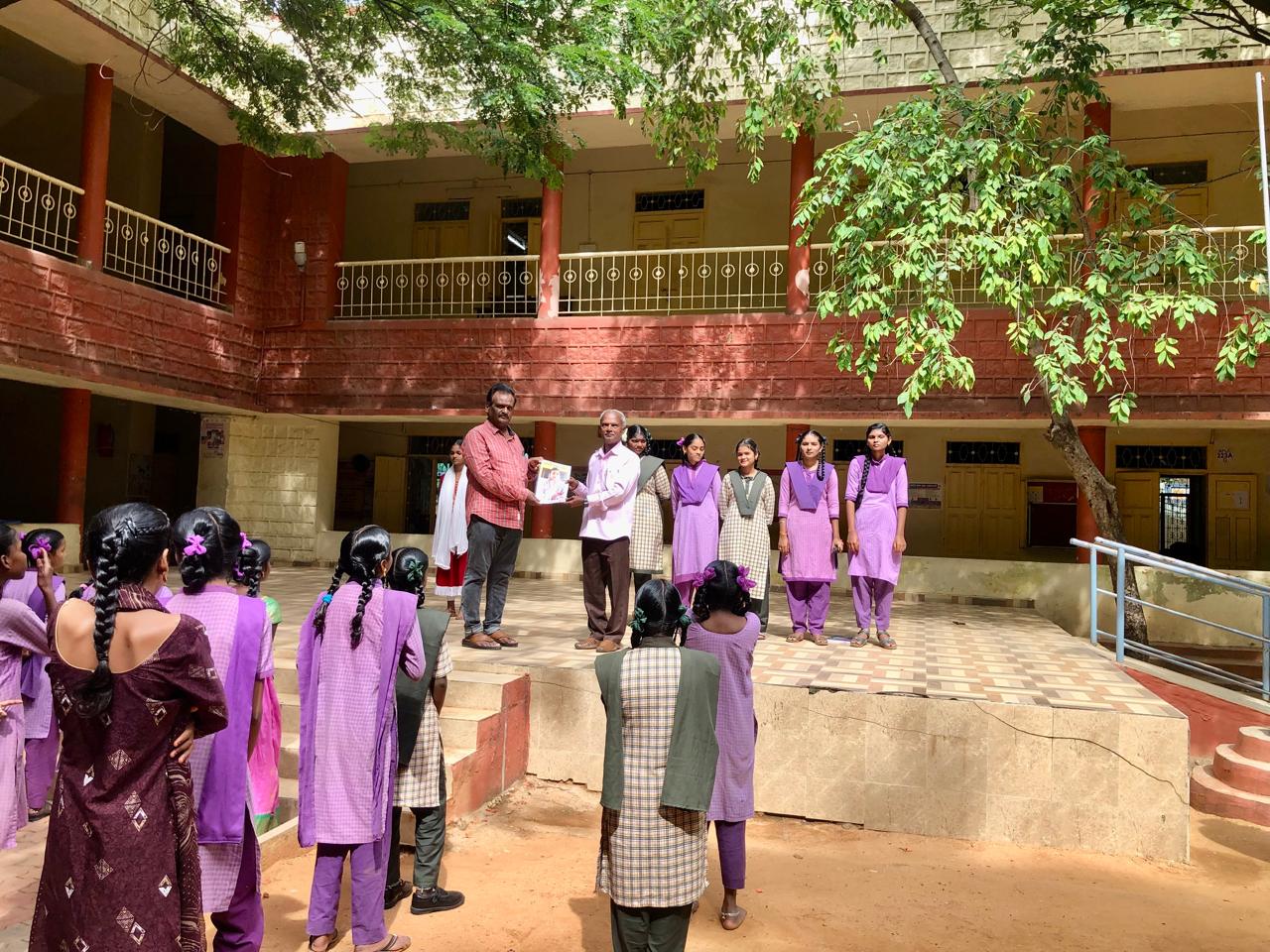 Workshop on Super Brain Yoga-Presented copy of research paper to Head Master.