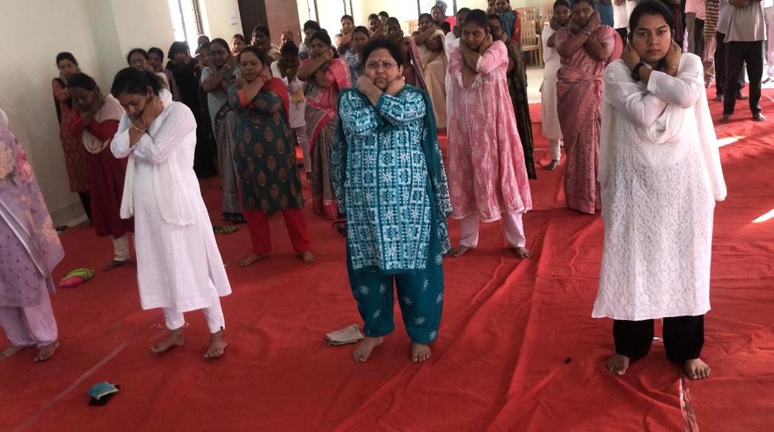 Positioning of arms on abdomen during Workshop on Super Brain Yoga at Nizamabad Dist. Court Complex-Conference Hall on the eve of International Yoga Day i.e., on 21-06-2025.