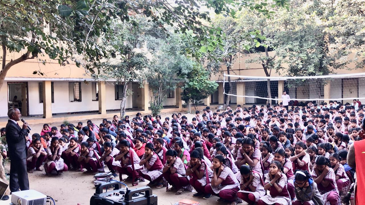 Students performing Super Brain Yoga at Model Junior College, Amadabakula, Kottakota, Wanaparthi Dist.