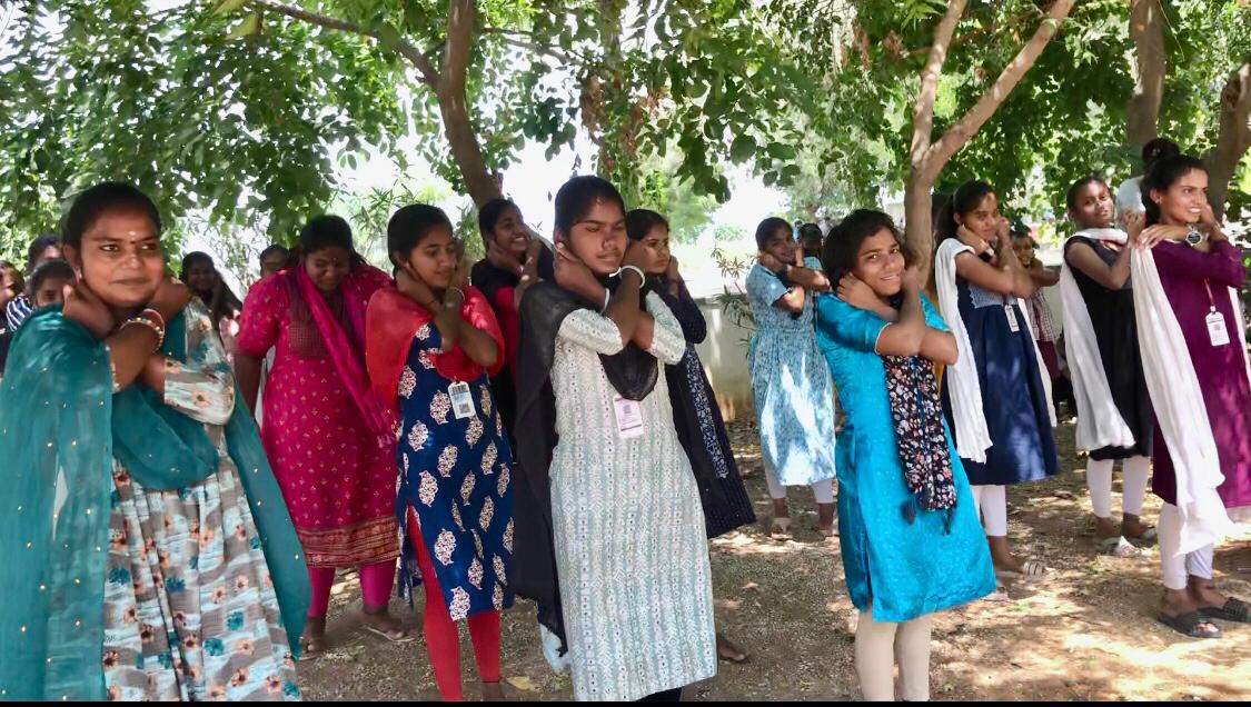 Students performing Super Brain Yoga at NSS Unit-I, Govt. Degree College, Dhatpally Special Camp organized at Seethaipet village, Dharpally Mandal.
