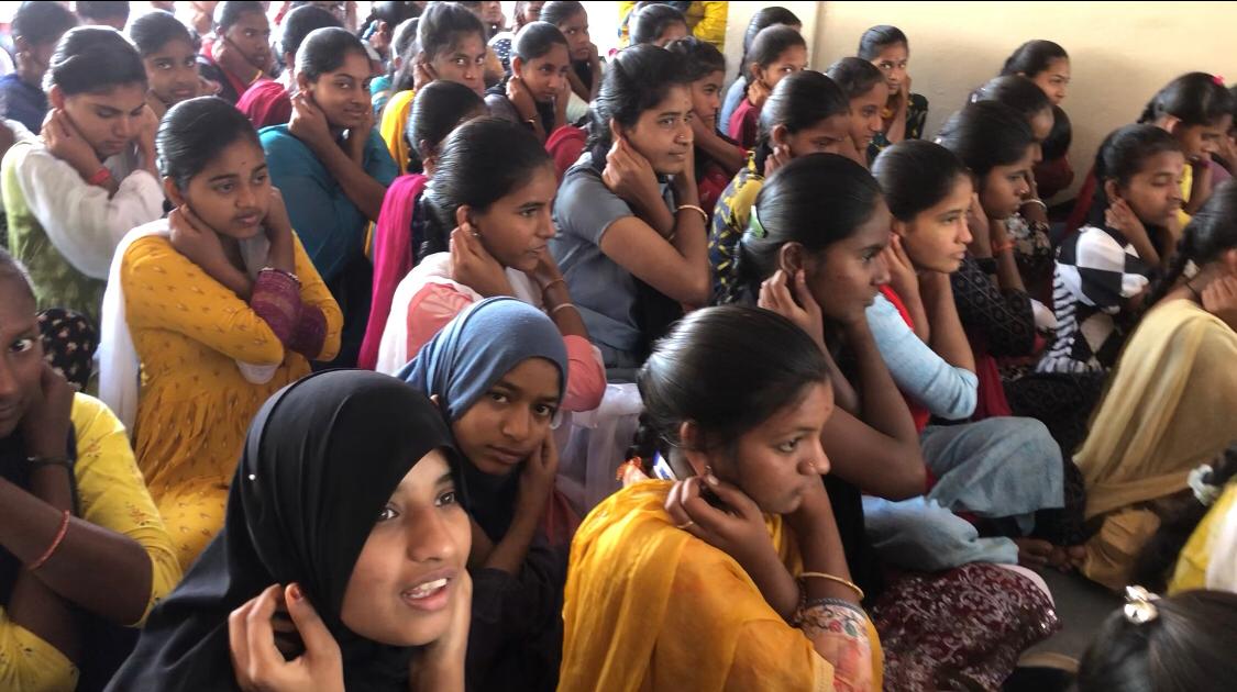 Positioning of fingers on earlobes-Workshop on Super Brain Yoga at Govt. Junior College for Girls, Gadwal, Jogulamba-Gadwal Dist. 