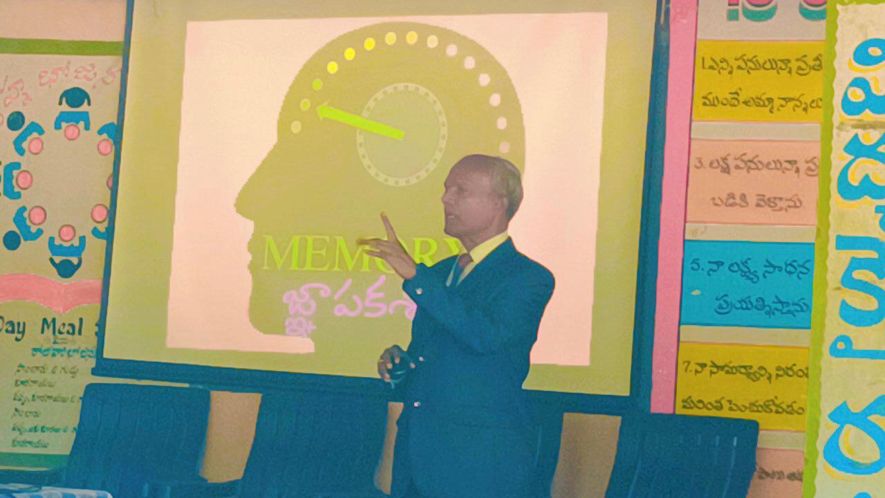 Explaining the benefits of Super Brain Yoga at Zilla Parishad High School, Kalhair, Sanga Reddy Dist.