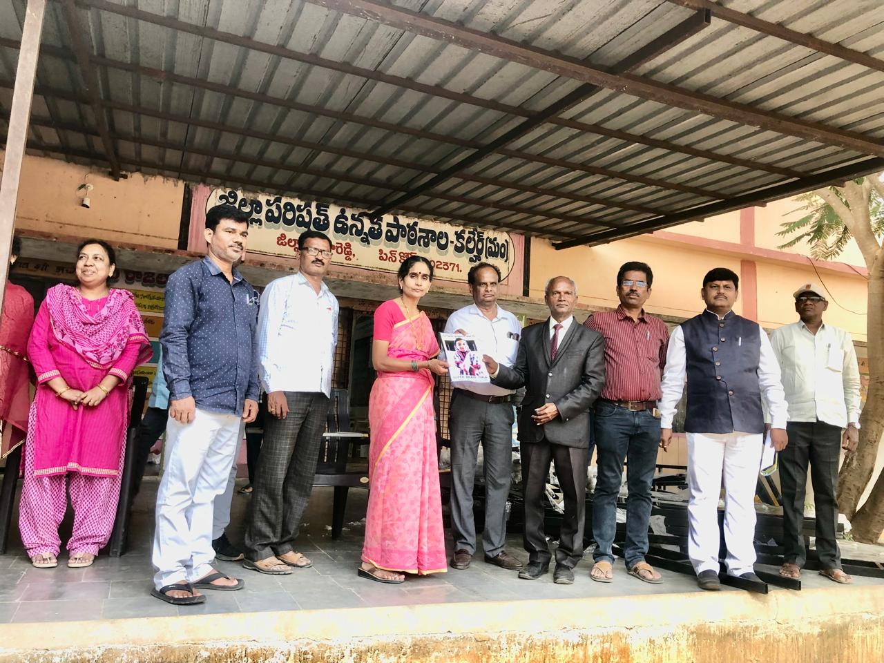 Presenting copy of article published in SCERT Compendium to HM, ZPHS, Kalhair & Mandal Education Officer, Kalhair-Workshop on Super Brain Yoga at Zilla Parishad High School, Kalhair, Sanga Reddy Dist.