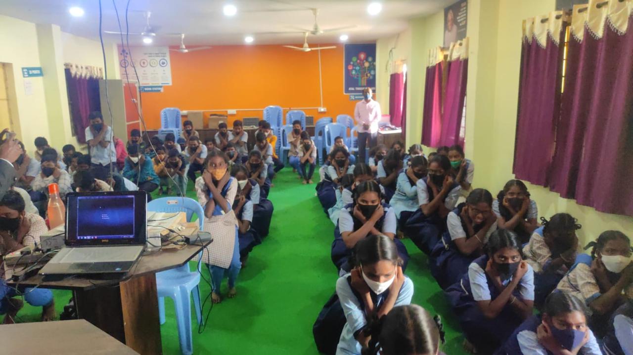 Positioning of fingers on earlobes-Workshop on Super Brain Yoga at Zilla Parishad High School, Vailpur, Nizamabad Dist.