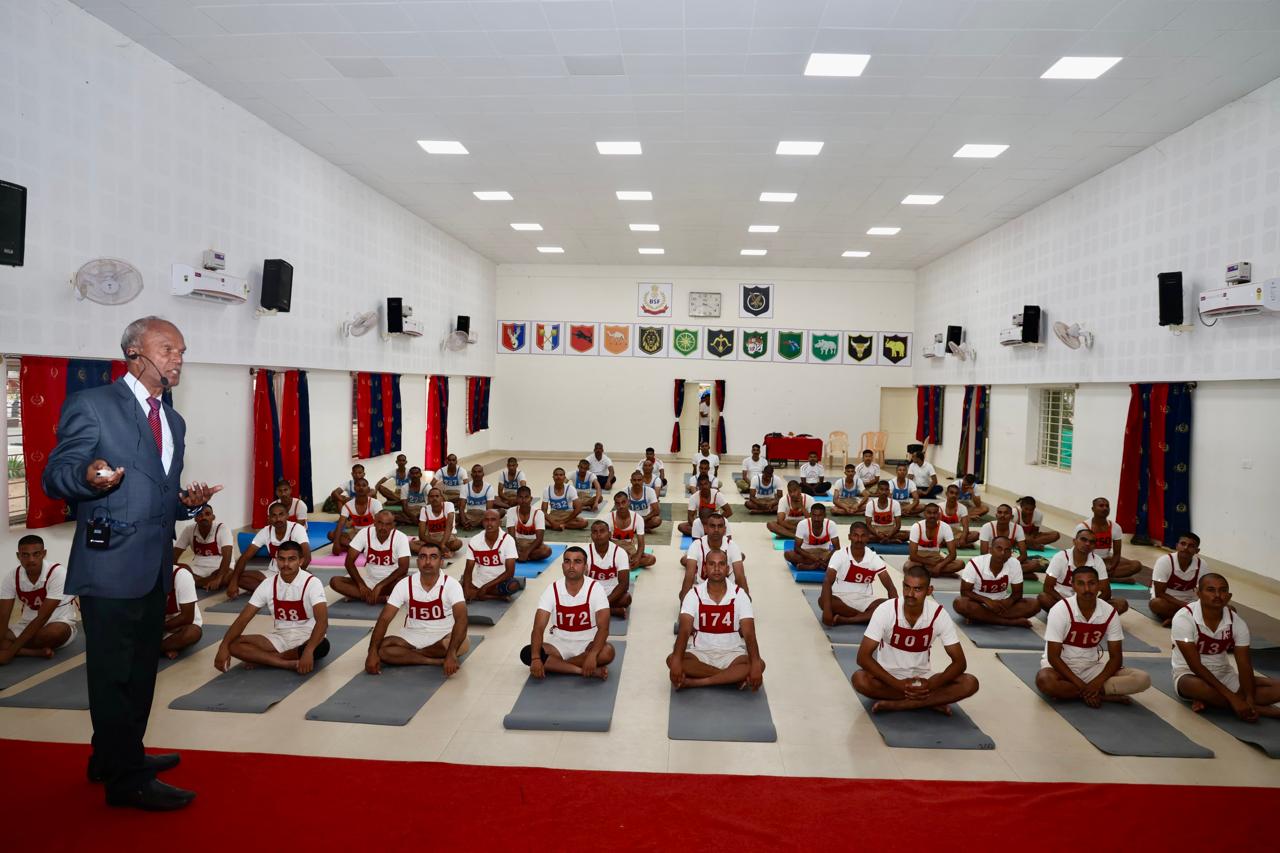 Explaining the benefits of  Super Brain Yoga at Border Security Force (STC), Yelhanka, Bangalore, Karnataka state.