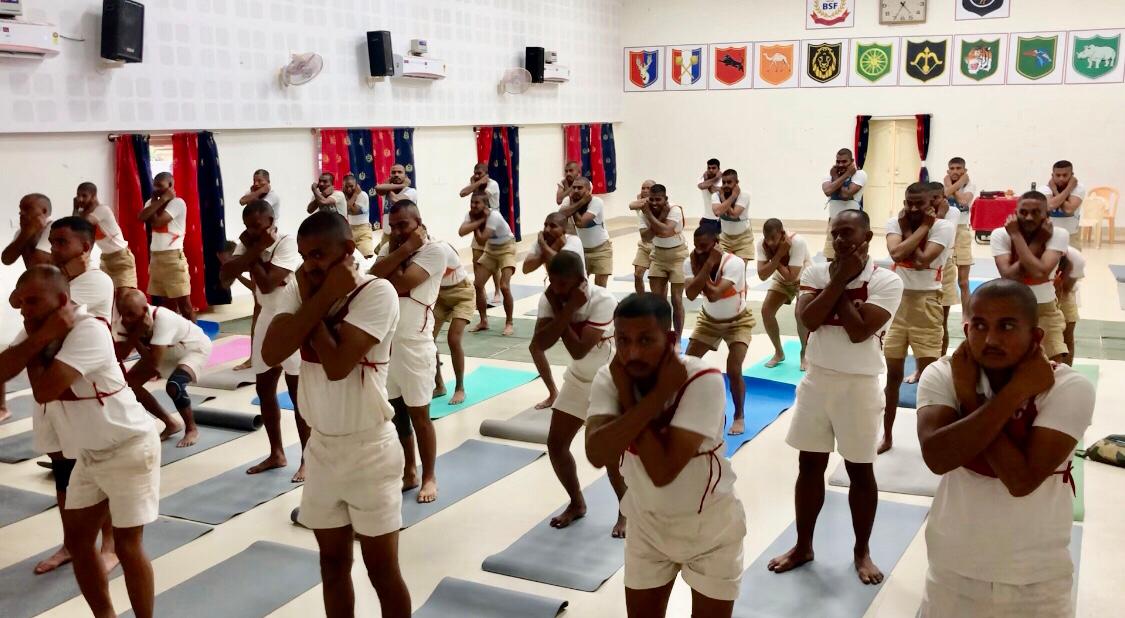 Participants performing Super Brain Yoga at Border Security Force (STC), Yelhanka, Bangalore, Karnataka state.