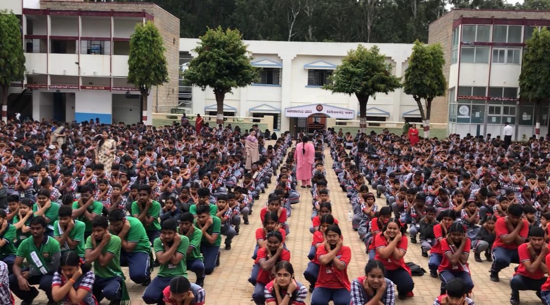 Students performing Super Brain Yoga - Workshop on Super Brain Yoga at PM Sri Kendriya Vidyalaya, Air Force Station, Yelhanka, Bangalore, Karnataka state.