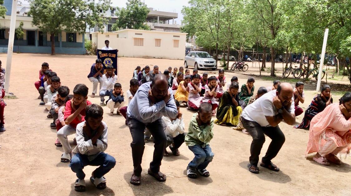 Students & Staff performing 14 rounds of  Super Brain Yoga as part of Workshop at Govt. High School, Kotagalli, Shankar Bhavan, Nizamabad sponsored by Lions International, Nizamabad-Netha, Club No. 155665, Dist: 320 D.