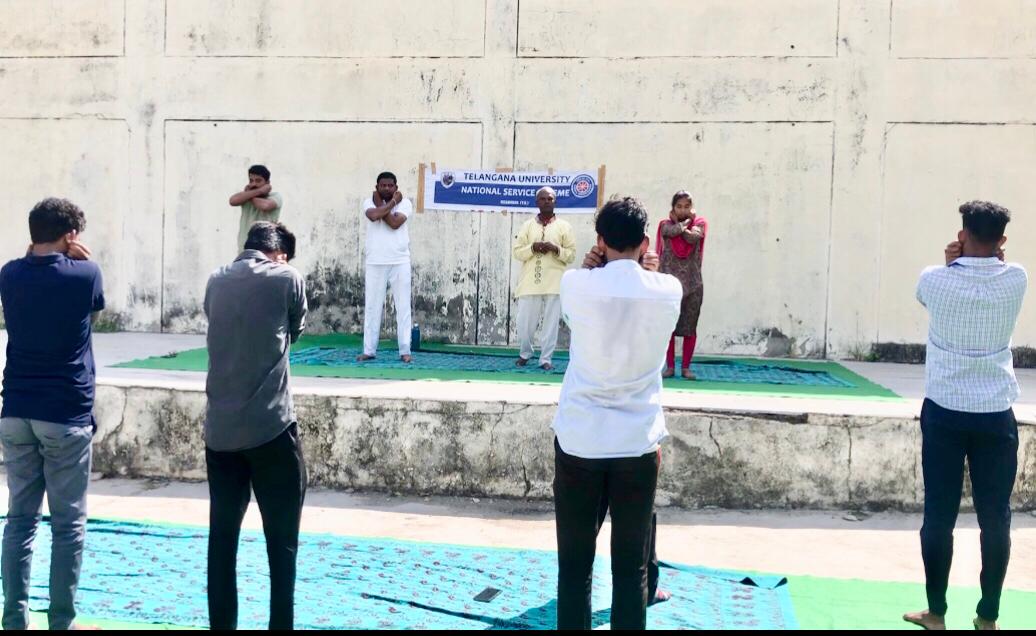 Positioning of Arms on Abdomen-Workshop on Super Brain Yoga at Telangana University organized by NSS Cell on the occasion of 12th International Day of Yoga.