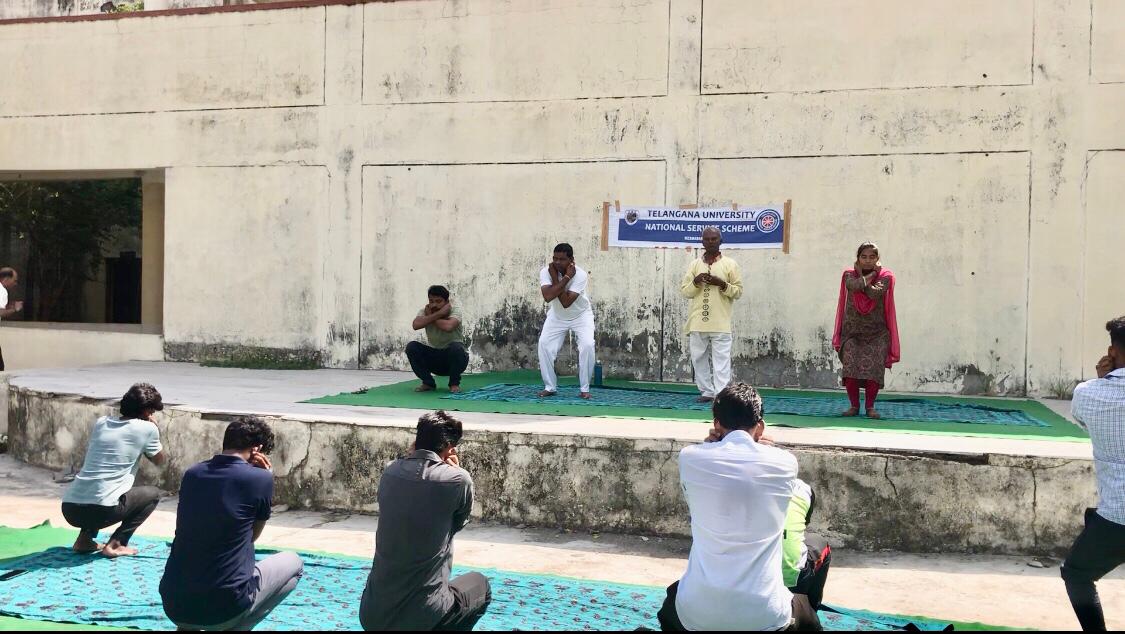 Participants performing Super Brain Yoga-Workshop on Super Brain Yoga at Telangana University organized by NSS Cell on the occasion of 12th International Day of Yoga.