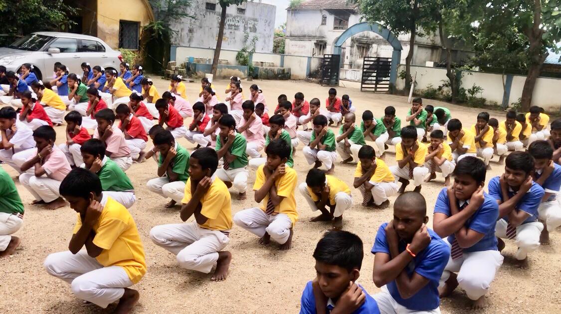 HM, Staff and Students performing Super Brain Yoga at Zilla Parishad High School, JAKORA, Varni Mandal, Nizamabad Dist.