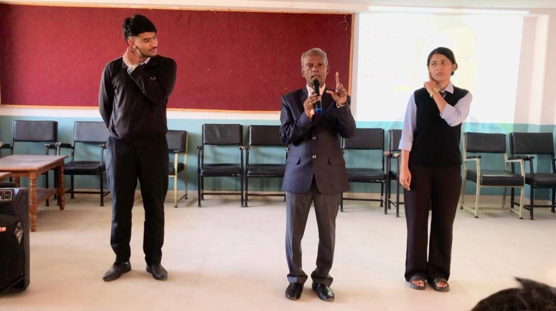 Positioning of fingers on earlobes - Workshop on Super Brain Yoga at Jana Priya College Multiple Campus, Jana Priya Marg, POKHARA-8, Nepal Country.