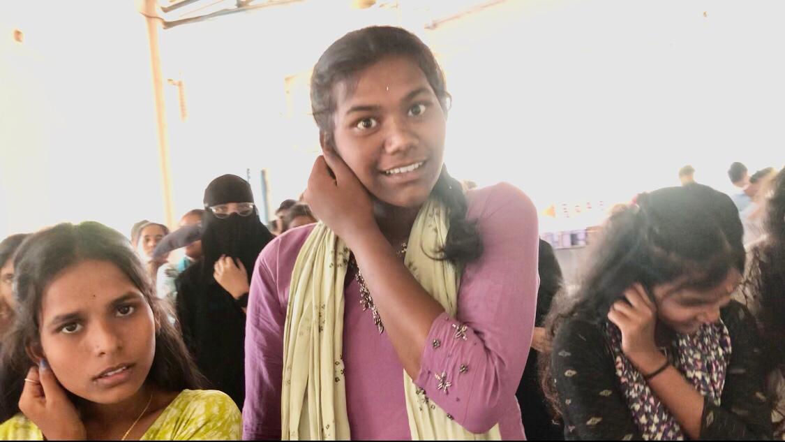 Positioning of fingers on earlobes by SSC Supplementary Students - Workshop on Super Brain Yoga at  Govt. High School, Kota Gally (Shankar Bhavan), Nizamabad 