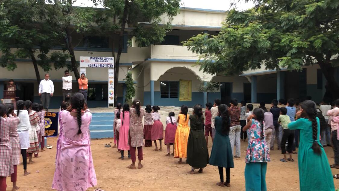 Staff and students performing 14 rounds of  Super Brain Yoga at P.M. Sri Zilla Parishad High School, MALLARAM, Nizamabad Mandal & District.