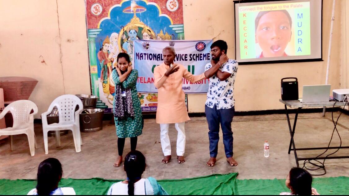 Demonstration on Super Brain Yoga as part of workshop at Summer Special Camp, National Service Scheme Unit-II, Telangana University organized at Dichpally village on 26-04-2026.