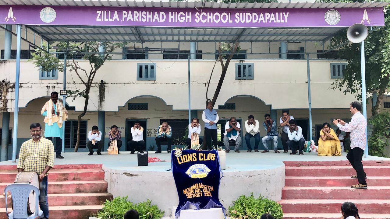 Staff performing Super Brain Yoga - Workshop on Super Brain Yoga at Zilla Parishad High School, Suddapally, Dichpally Mandal, Nizamabad Dist. The program was sponsored by International Lions Club of Nizamabad-Netha.