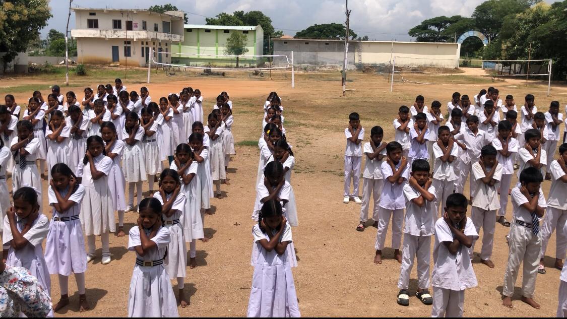 Positioning of arms on abdomen- Workshop on Super Brain Yoga at Zilla Parishad High School, Suddapally, Dichpally Mandal, Nizamabad Dist. The program was sponsored by International Lions Club of Nizamabad-Netha.