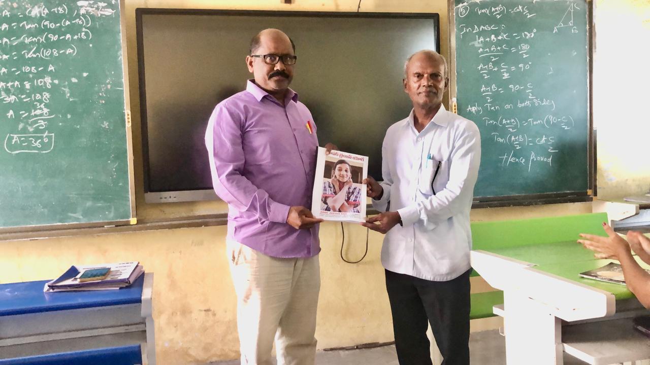 Presenting copy of article on Super Brain Yoga published in SCERT Compendium to HM - Workshop on Super Brain Yoga at Zilla Parishad High School, KESAEA, Medchal - Malkajgiri Dist.
